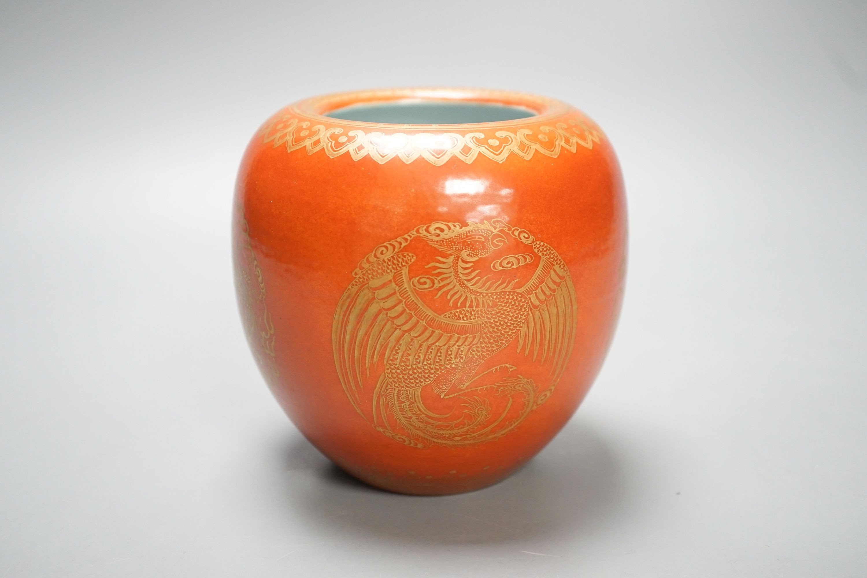 A Chinese coral ground brushwasher, with gilt phoenix design 11cm